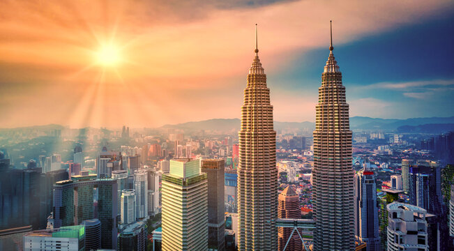 Aerial view of Kuala Lumpur city skyline at sunset in Kuala Lumpur, Malaysia.