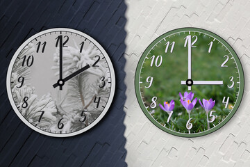 Two wall clocks against a white brick wall, divided in half by a shadow. The transition of time, the change to daylight saving time, the shift to summer time, moving the hands forward.