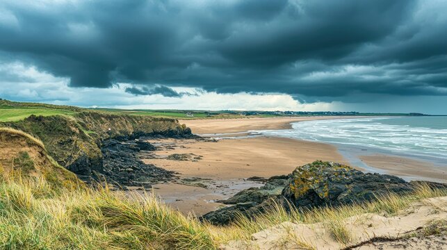 A beach at the brink of a storm, with dramatic weather shifting the atmosphere of the landscape.