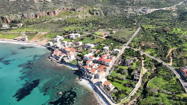 Aerial view of the coast and village of Neo Itylo with mountains in the background. Located in Mani, Laconia, Greece