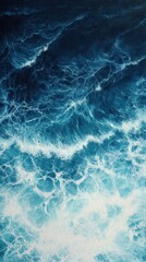Obraz premium Turbulent beauty, An aerial view of oceanic waves in varying blue hues
