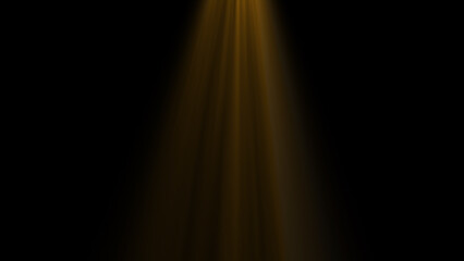 A single golden spotlight shines brightly from the top onto a studio stage, casting a warm and luxurious glow against the black background