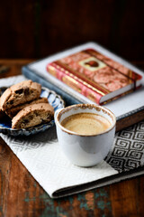 Cup of coffee and Cantuccini (Italian cookie) on dark wooden background. Copy space.	