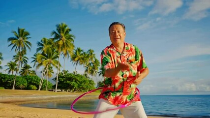 Smiling Asian senior man hula hooping on a tropical beach - Powered by Adobe
