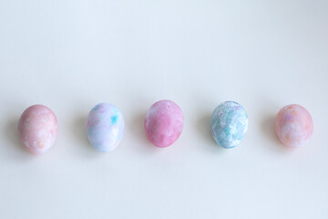 Easter eggs are painted with pastel colors