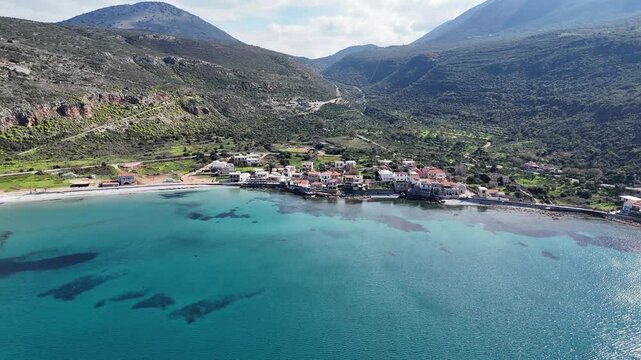 Aerial view of the coast and village of Neo Itylo with mountains in the background. Located in Mani, Laconia, Greece
