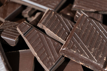 Delicious dark chocolate segments, rich black chocolate texture