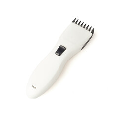 A sleek electric hair clipper sits on a smooth surface, showcasing its modern design ideal for home or professional use