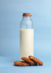 a bottle of milk and cookies