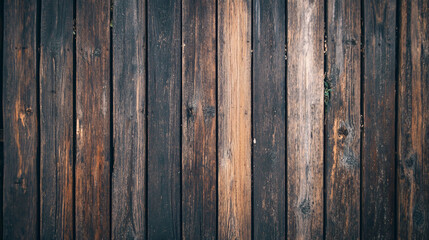 Fototapeta premium Vertical wooden planks creating a textured brown and dark surface