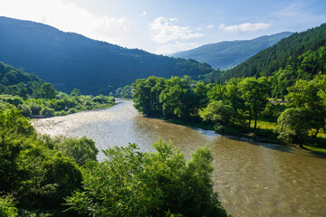 Beautiful landmark near the Borjomi with Kura river and mountain forest. © vahanabrahamyan