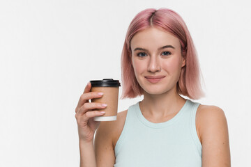Fototapeta premium Close up of young hipster girl female student wear casual clothes hold takeaway delivery craft paper brown cup coffee to go isolated on white background studio portrait copy empty free space