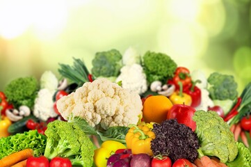 Tasty fresh ripe vegetables and fruits setting.