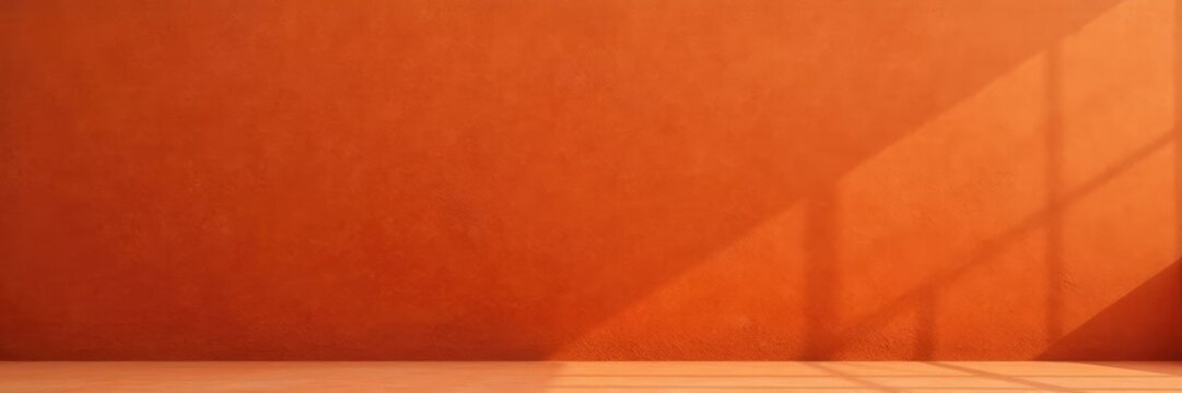Wide-angle shot of terracotta plastered wall with subtle texture and orange tone, walls, textured, neutral
