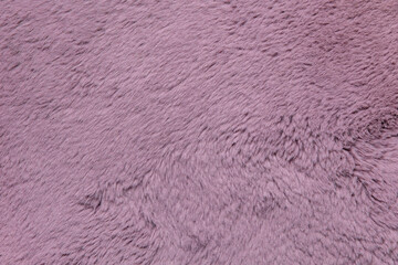 Texture of artificial pink fur. Animal fur dyed