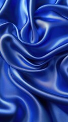 Fototapeta premium Royal blue silk fabric texture background with graceful waves and folds