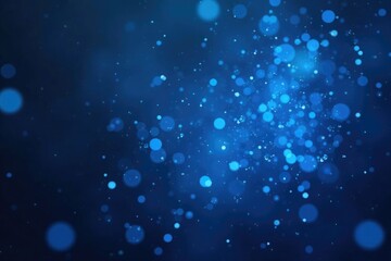 Shimmering blue particles suspended in a hazy background, glowing