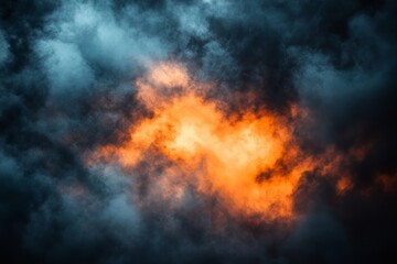 A cloud with orange and blue streaks.  Abstract gradient background, with orange and navy blue hues, a grainy film texture