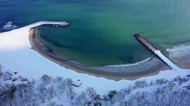 Aerial view to beautiful Perla beach covered with snow at winter near to Primorsko, Bulgaria