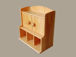 The gray background in the picture is a brown wooden wall mounted shelving unit that can be used as a multipurpose storage cabinet or medicine cabinet in the home. It has many compartments and is comp