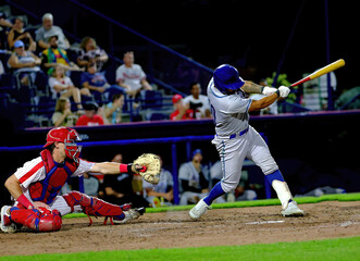 hitting baseball player