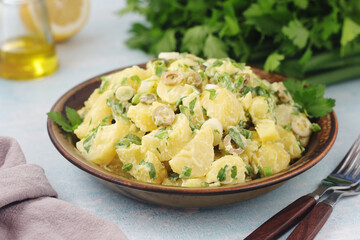 A bowl with Greek potato salads	