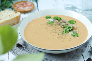 A bowl with mushroom cream soup