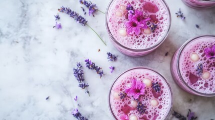 Refreshing Pink Lavender Drink with Bubbles and Floral Garnish