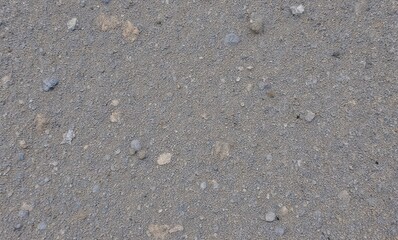 Close-up of textured gray asphalt surface