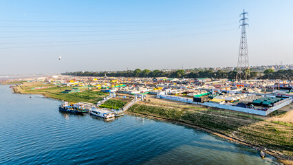Aerial view tent city at The Maha Kumbh Mela in Prayagraj, Uttar Pradesh at the Triveni Sangam in...