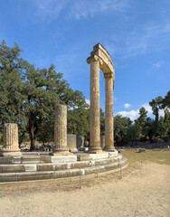 Olympia, Greece - July 4, 2024: Birthplace of the Olympic Games. Philippeion ruin against blue sky