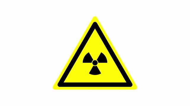 Animated Radiation Warning Symbol. This 4k video is with an alpha channel on a transparent background. Radiation hazard sign where the radiation symbol inside the yellow triangle continuously.