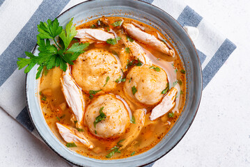 Matzoh ball and chicken soup