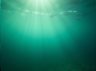 Obraz premium Underwater Sunlight Rays Through Ocean Water