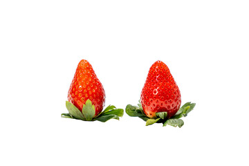 Two strawberries on a white background. One is slightly larger than the other. The stem of the larger strawberry is visible