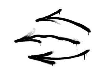 Graffiti arrows with overspray in black over white.
