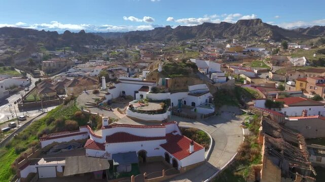 Guadix Cave Houses, Dewlling troglodyte city. Aerial of Prehistoric caves settlement in the mountains of Granada, Spain