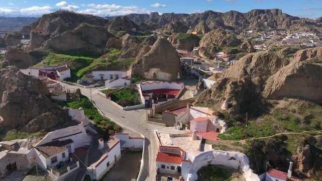 Guadix Cave Houses, Dewlling troglodyte city. Aerial of Prehistoric caves settlement in the mountains of Granada, Spain