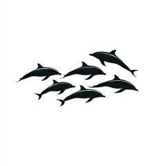 Fototapeta premium Silhouette of several dolphins in a pod, moving in the same direction.