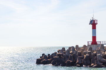 Lighthouse on the Black Sea in the city of Sochi in clear sunny weather.