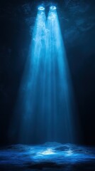 Bright blue lights shining down into a dark cavern creating an ethereal atmosphere underwater