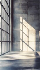 Obraz premium The natural sunlight streaming through a tall industrial window