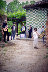 Jazz band of six people with different musical instruments, dressed in retro style