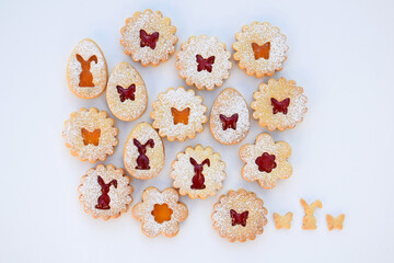 Linzer cookies filled with strawberry and apricot jam. Easter baking