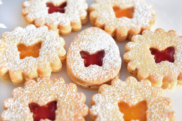 Linzer cookies filled with strawberry and apricot jam. Easter baking