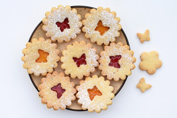 Linzer cookies filled with strawberry and apricot jam. Easter baking