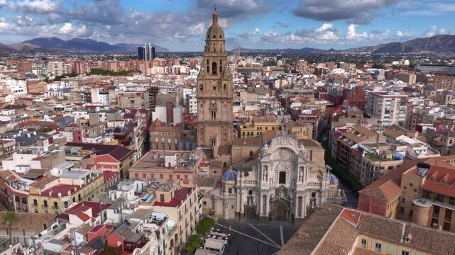 Aerial Drone Shot of Cathedral in Murcia, Spain and streets of City center Old Town. The Capital of Murcia Province. 