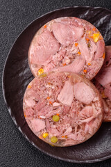 Homemade brawn with salt, spices, herbs and vegetables