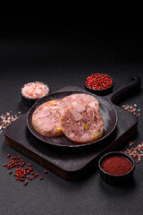 Homemade brawn with salt, spices, herbs and vegetables