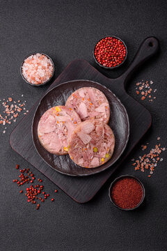 Homemade brawn with salt, spices, herbs and vegetables